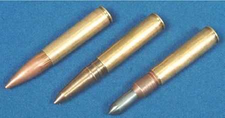 Three 12.7x55mm STs-130 cartridges laid side by side on a blue background, each with a different bullet tip: copper jacketed, plain brass, and grey-tipped