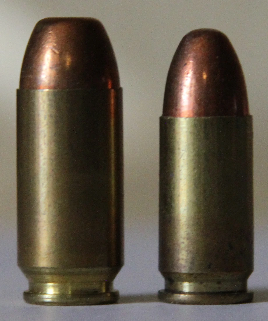 Two pistol cartridges side by side: a shorter, wider .41 Action Express round on the left with a rebated case, and a 9x19mm Parabellum round on the right