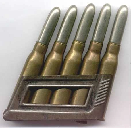 Five 8x50mmR Mannlicher cartridges loaded into a metal en-bloc clip
