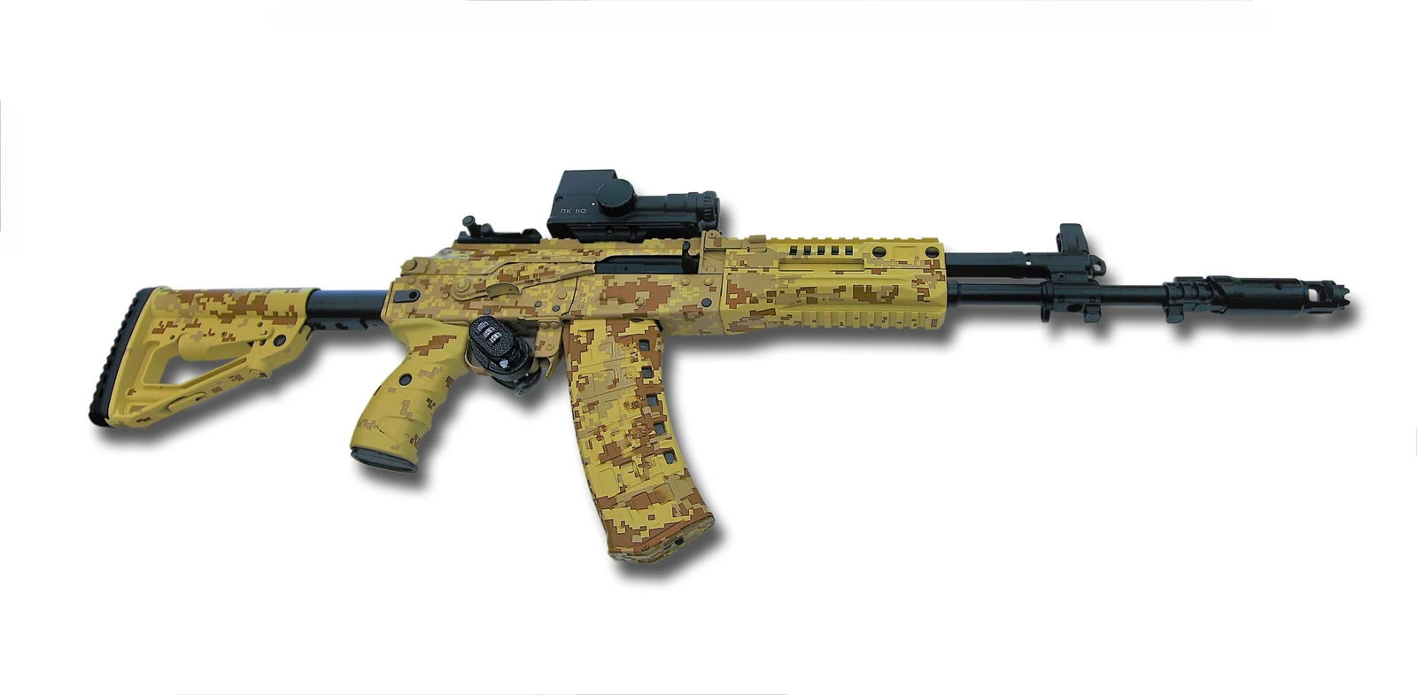 A camouflage-patterned AK-12 rifle with a red-dot sight mounted on a top rail, a skeletonised polymer stock and a curved magazine, shown against a plain white background