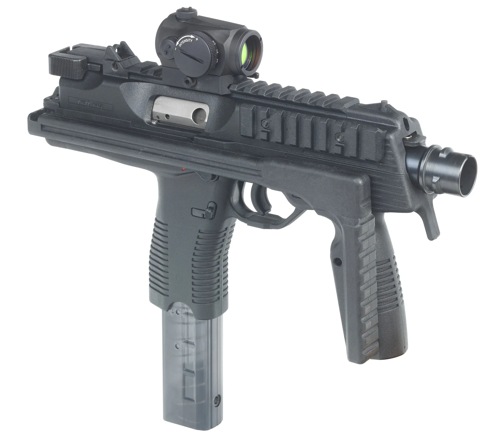 A compact black submachine gun with a folded stock along its top, a red-dot sight, a vertical pistol grip and a translucent curved magazine.