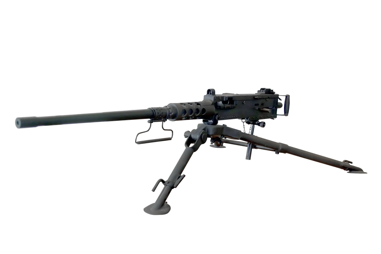 An M2 Browning heavy machine gun on a low tripod, isolated on white, seen from the left, with a very long heavy barrel, a perforated barrel support and spade grips at the rear