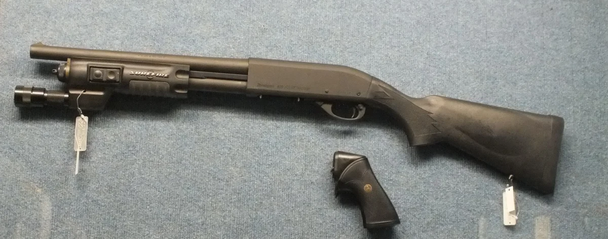 A Remington 870 P police shotgun displayed in a museum