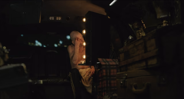 Still 13 of 14 from Holy Motors