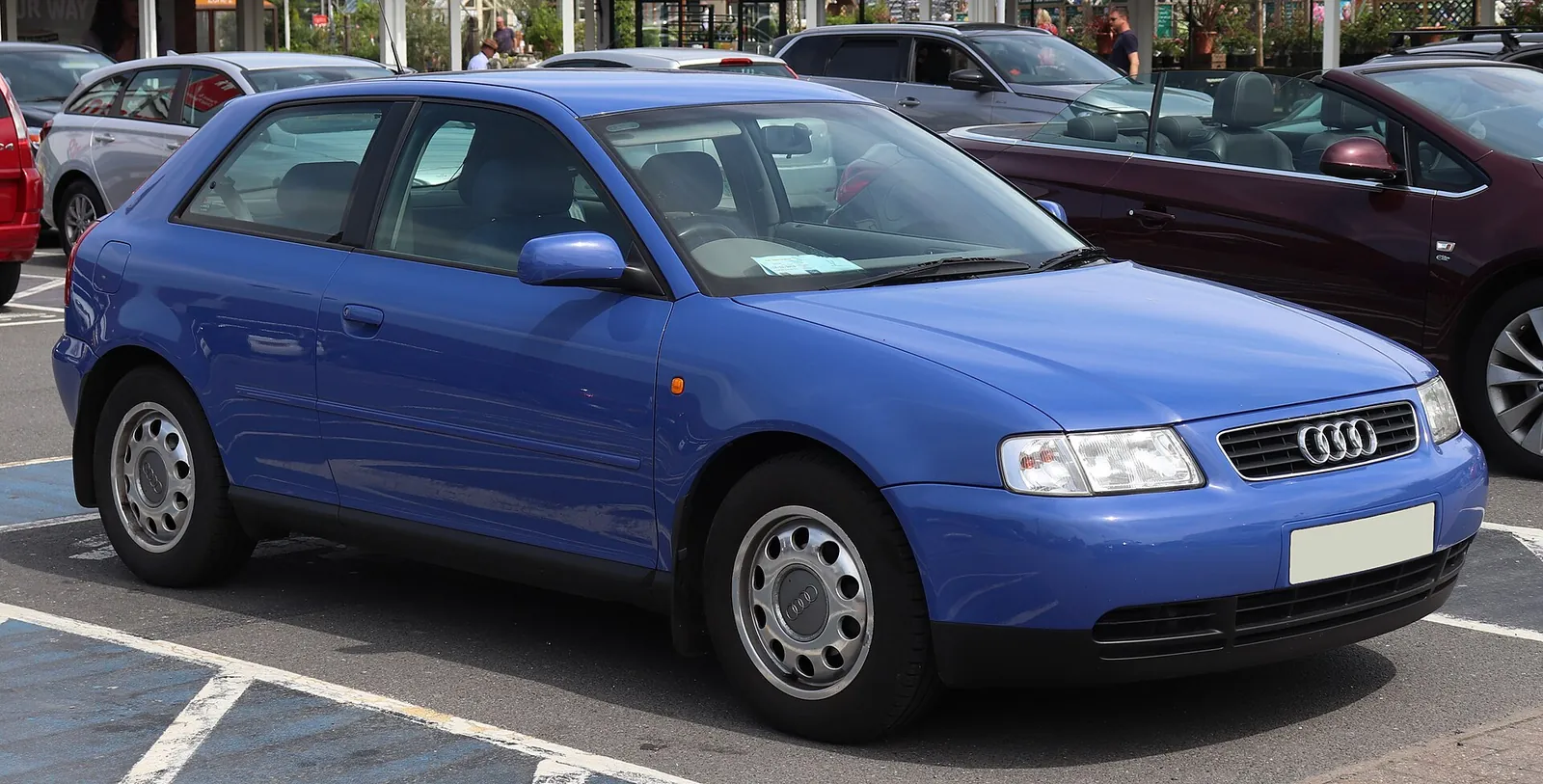 Blue 1998 Audi A3 three-door hatchback photographed from the front three-quarter angle