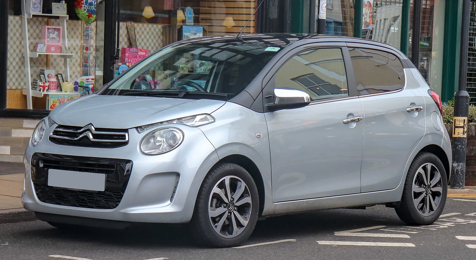 Silver second-generation Citroën C1 Flair hatchback photographed from the front three-quarter angle
