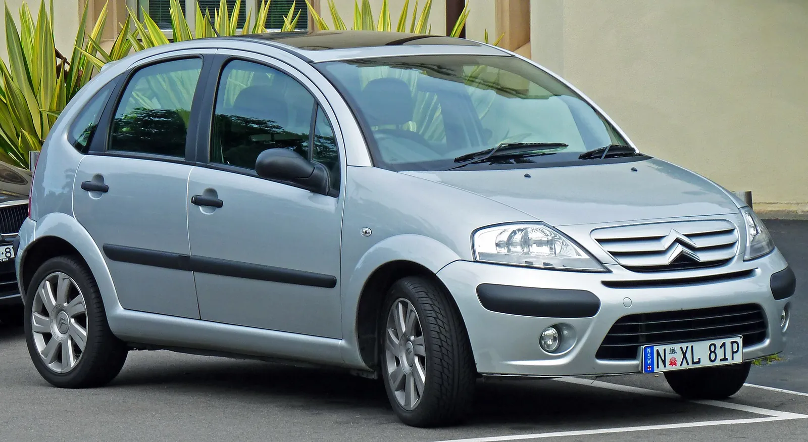 Silver first-generation Citroën C3 hatchback photographed from the front three-quarter angle, Exclusive facelift trim