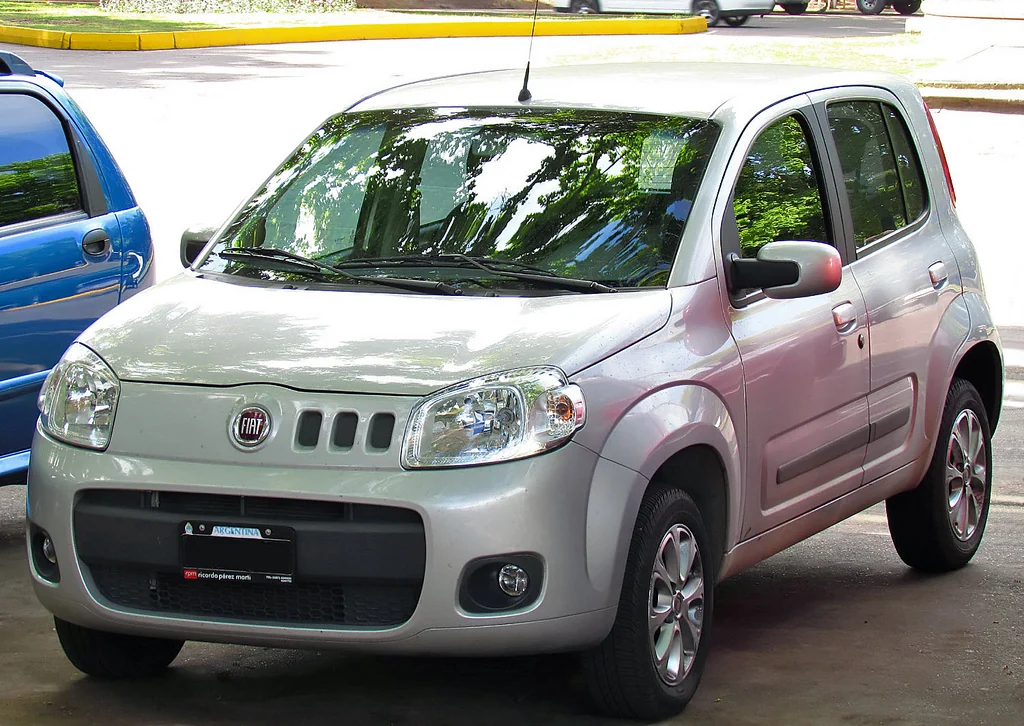 Silver second-generation Fiat Uno (Type 327) photographed from the front three-quarter angle, showing its rounded, more modern hatchback body