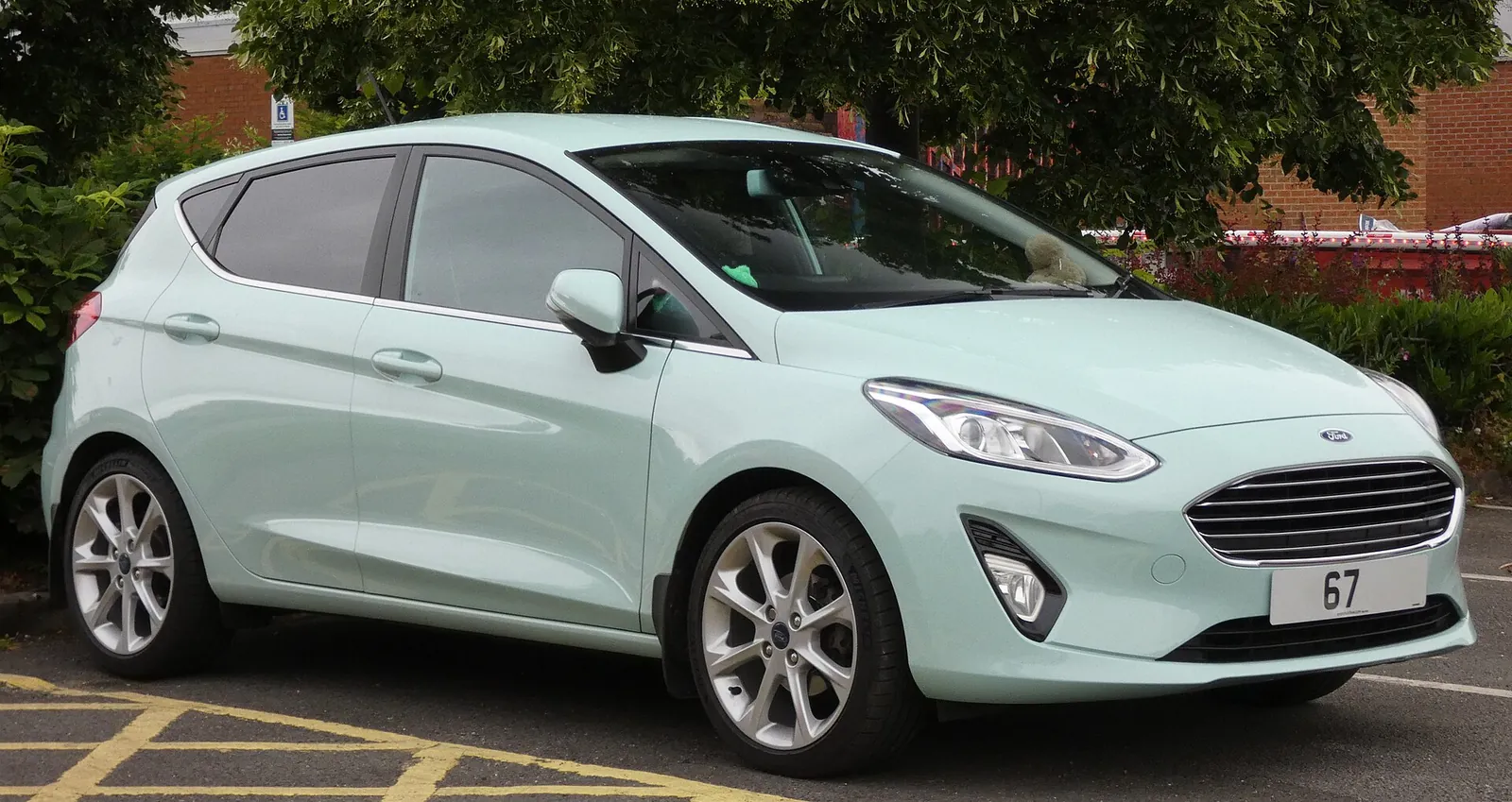 Mint green 2017 Ford Fiesta B&O Play Titanium hatchback photographed from the front three-quarter angle