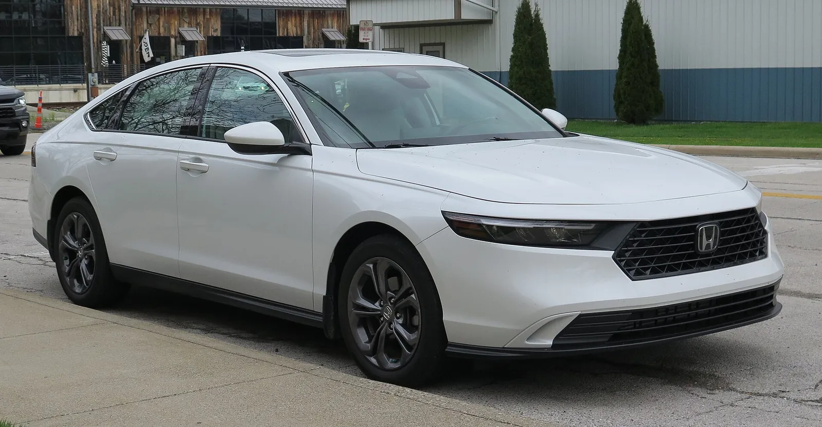 White eleventh-generation Honda Accord EX photographed from the front three-quarter angle