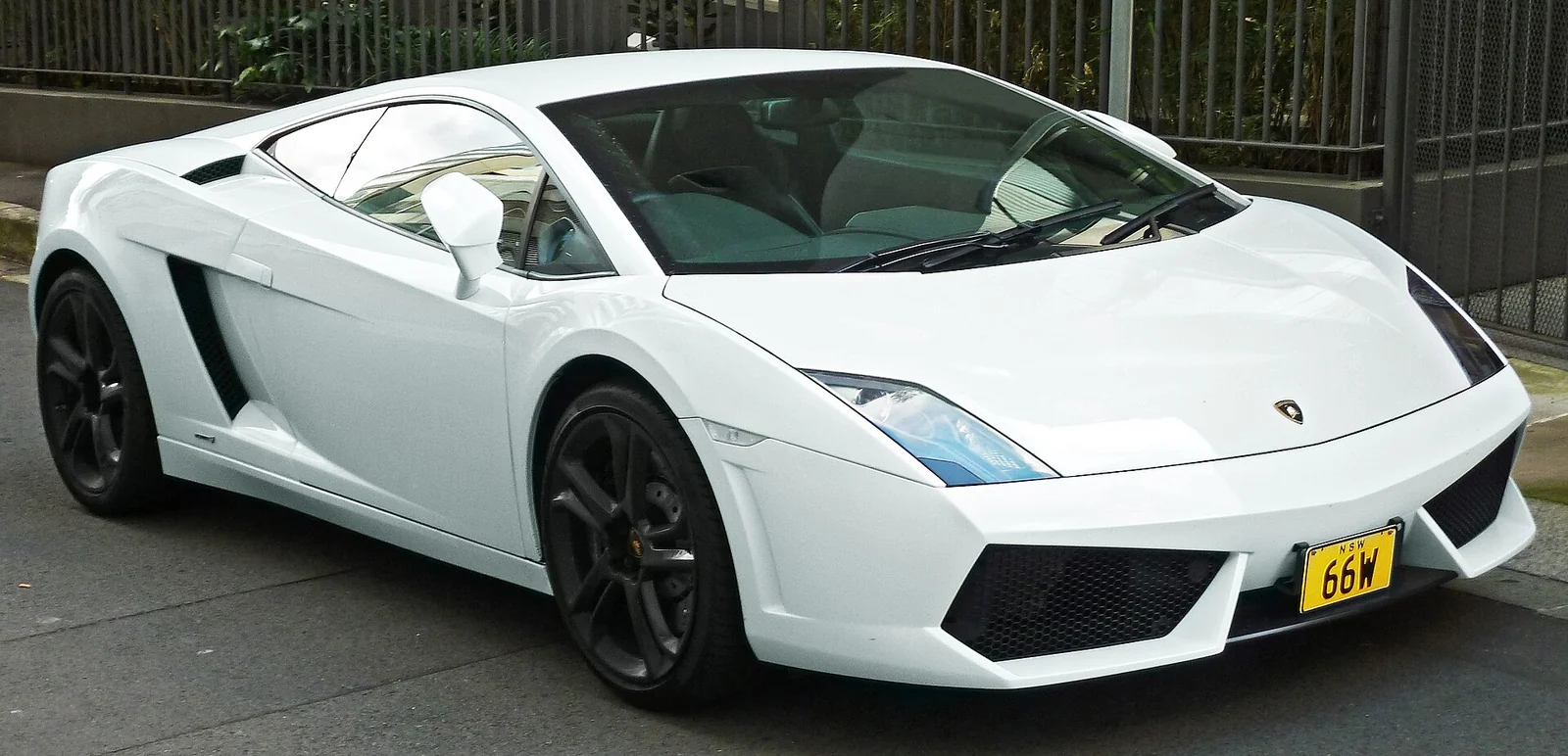 White Lamborghini Gallardo LP 550-2 coupé photographed from the front three-quarter angle