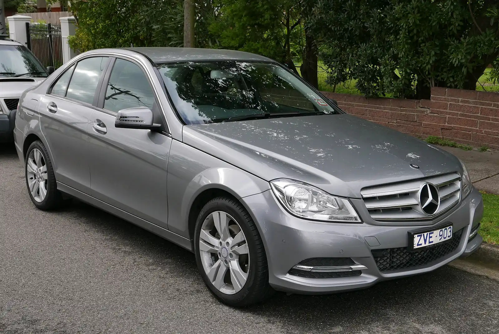 Silver third-generation Mercedes-Benz C-Class sedan photographed from the front three-quarter angle
