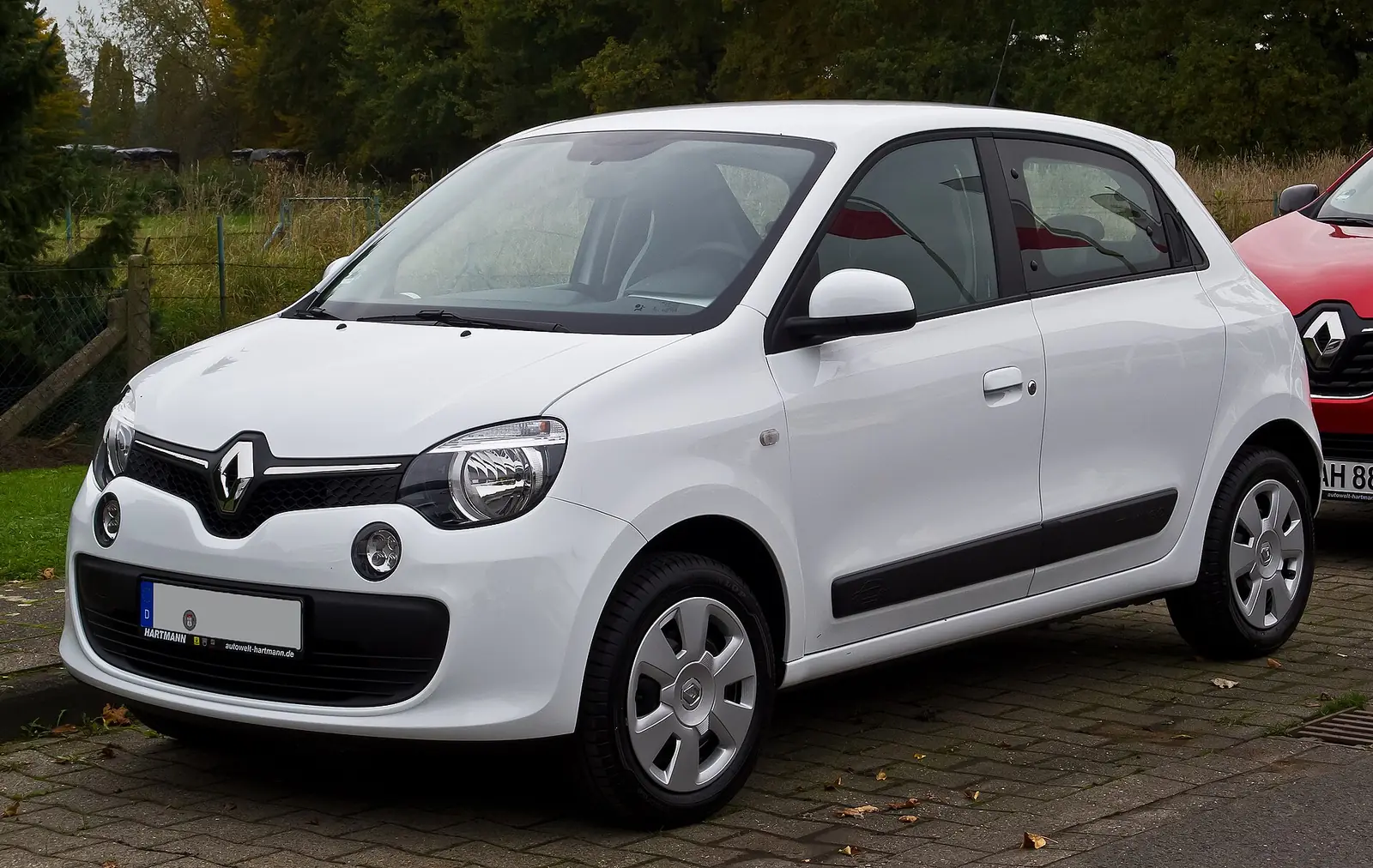 White five-door third-generation Renault Twingo photographed from the front three-quarter angle