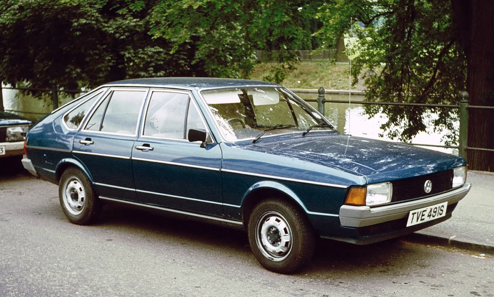 Blue Volkswagen Passat B1 five-door hatchback photographed from the front three-quarter angle