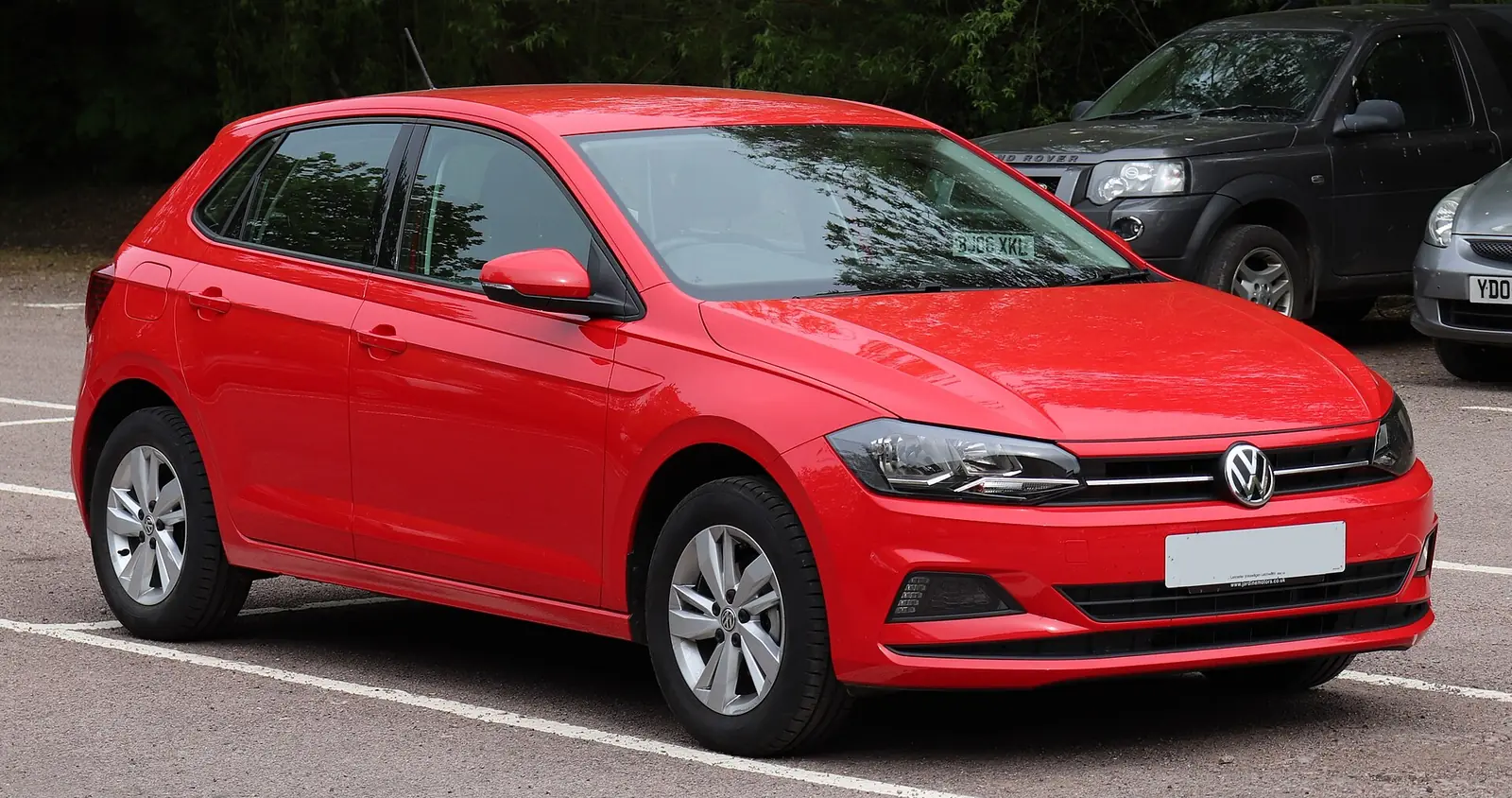 Red 2018 Volkswagen Polo SE hatchback photographed from the front three-quarter angle