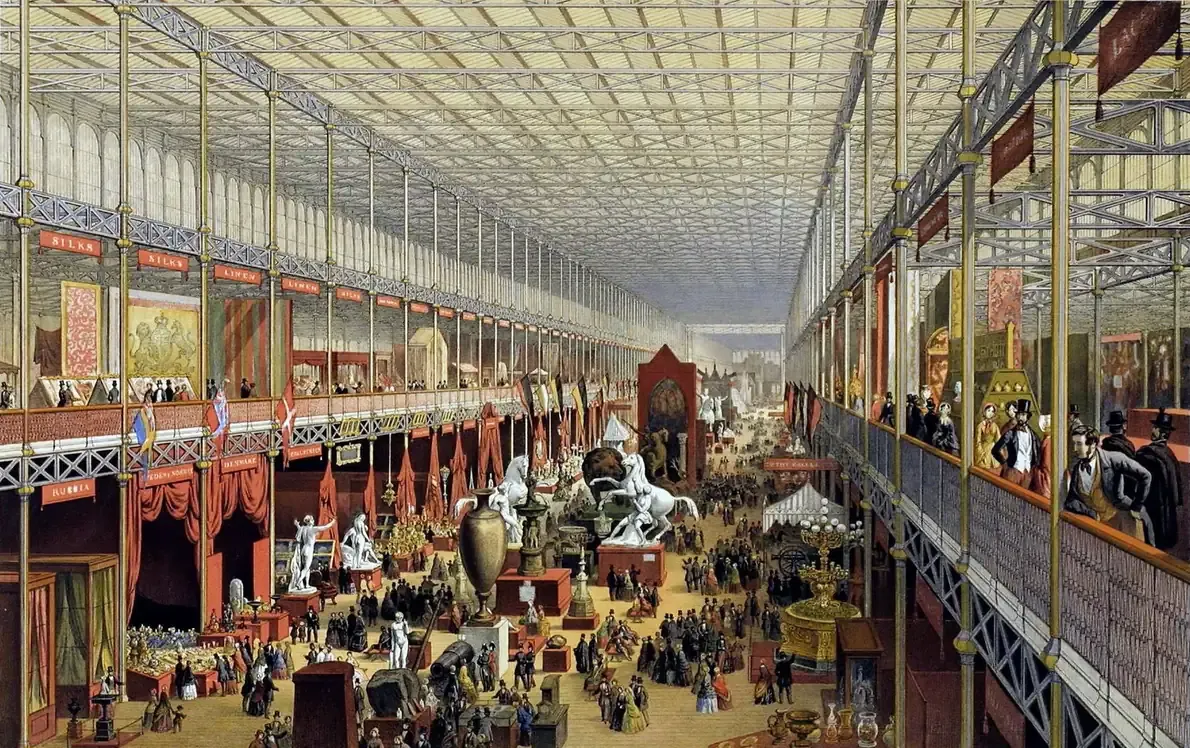 A coloured lithograph of the exhibition's glazed interior, crowded with visitors beneath a soaring transept roof.
