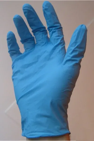 A single blue disposable glove, palm facing the camera, photographed against a plain light background.