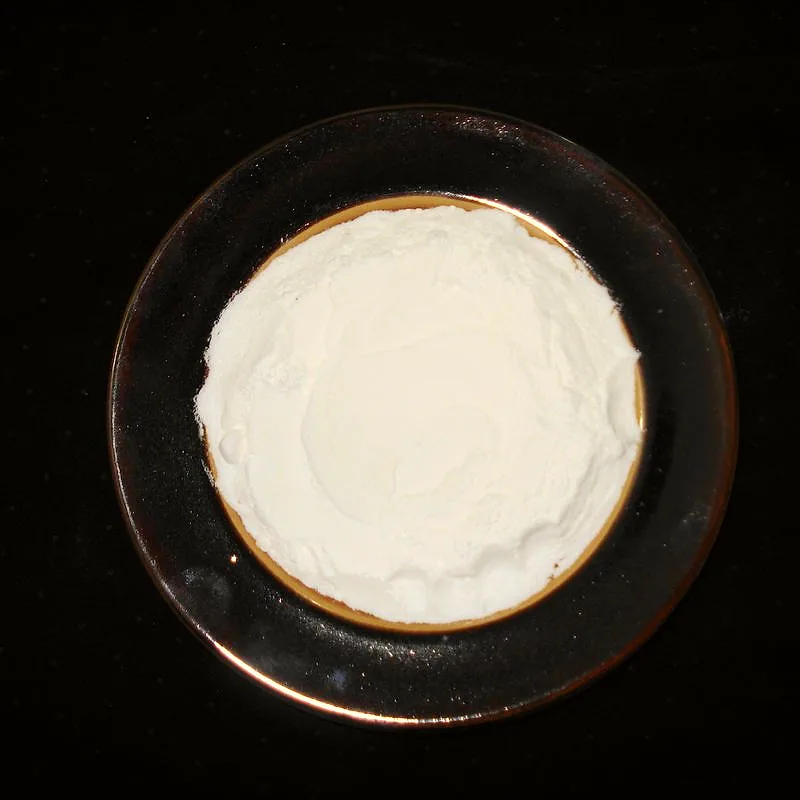 A small dish of fine white baking powder
