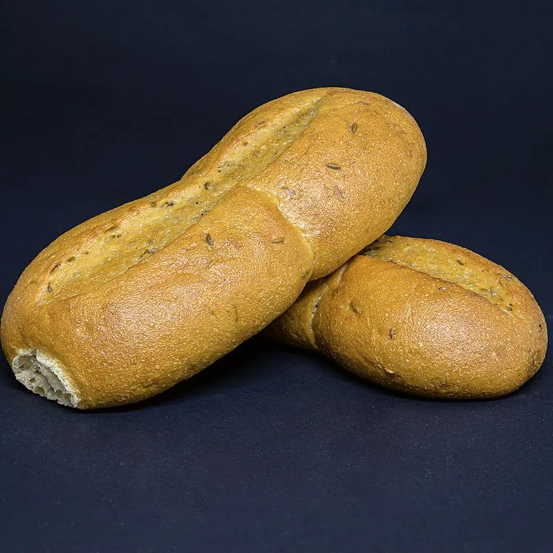 Two oblong crusty bread rolls with a golden-brown baked crust