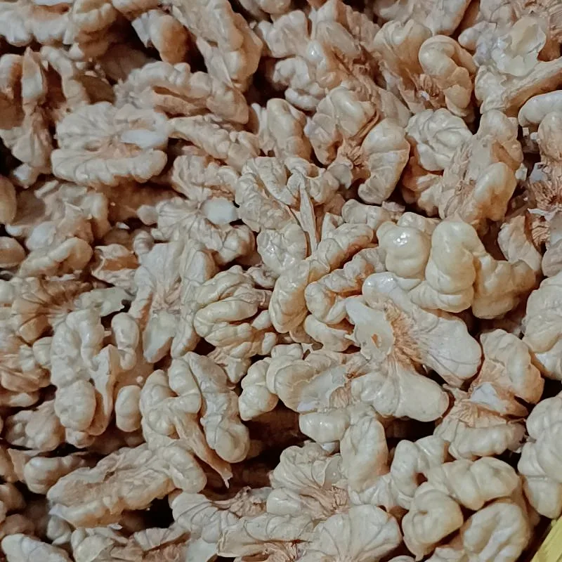 A pile of shelled walnut kernel halves
