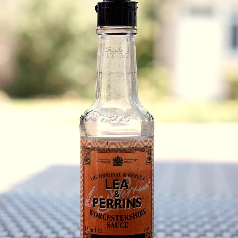 A narrow bottle of dark Worcestershire sauce