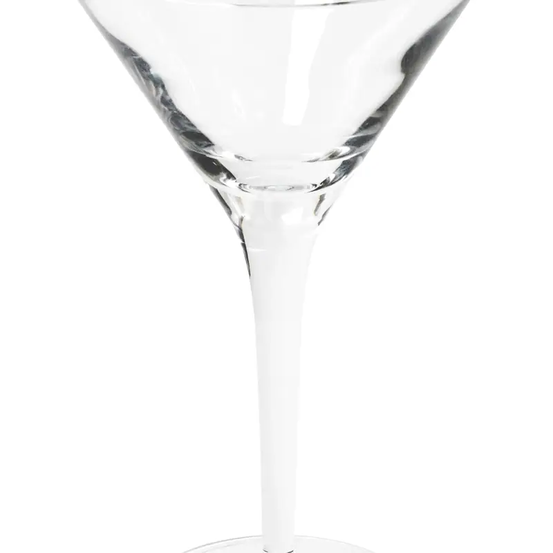 An empty conical martini glass on a stem, photographed against a plain white background
