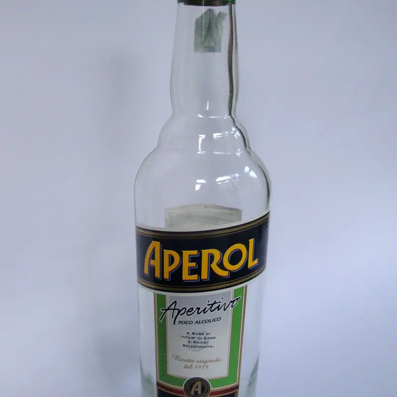 A bottle of Aperol with its orange and black label