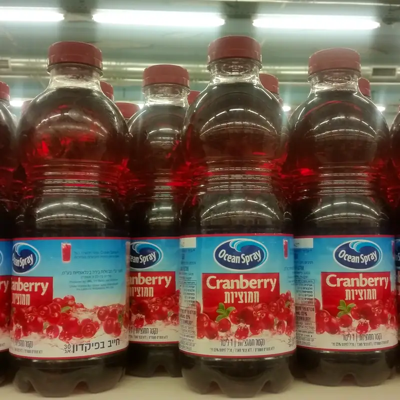 Bottles of Ocean Spray cranberry juice on a shelf
