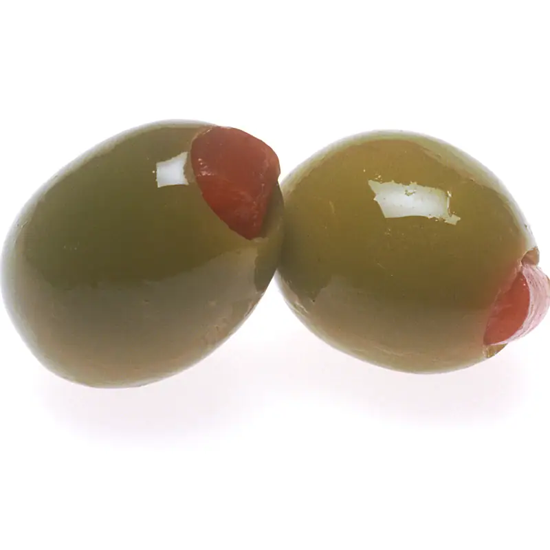Pimento-stuffed green olives, glossy and shown close up against a plain white background