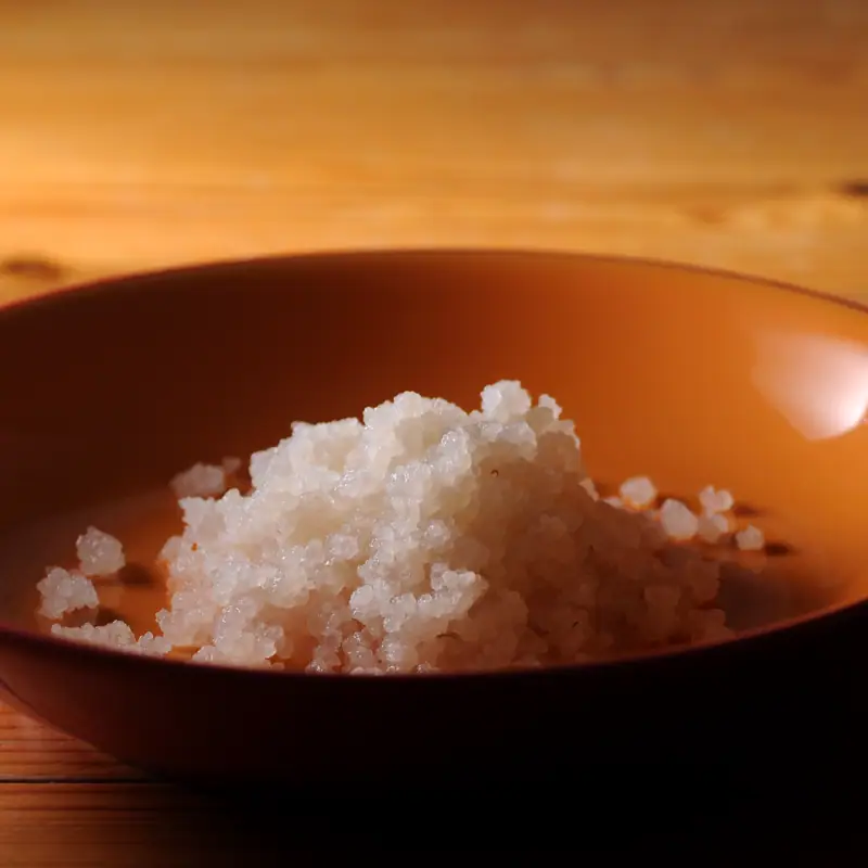 A pile of translucent crystalline water kefir grains in a bowl