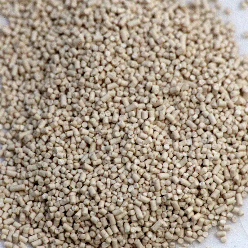 A pile of pale tan active dry yeast granules